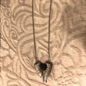 Short length silver winged black heart necklace